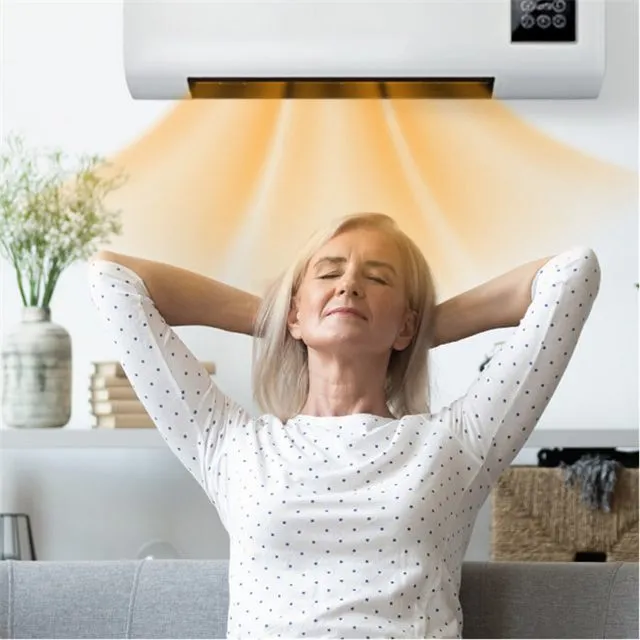 Woman relaxing under the warm air flow of the Heatoor