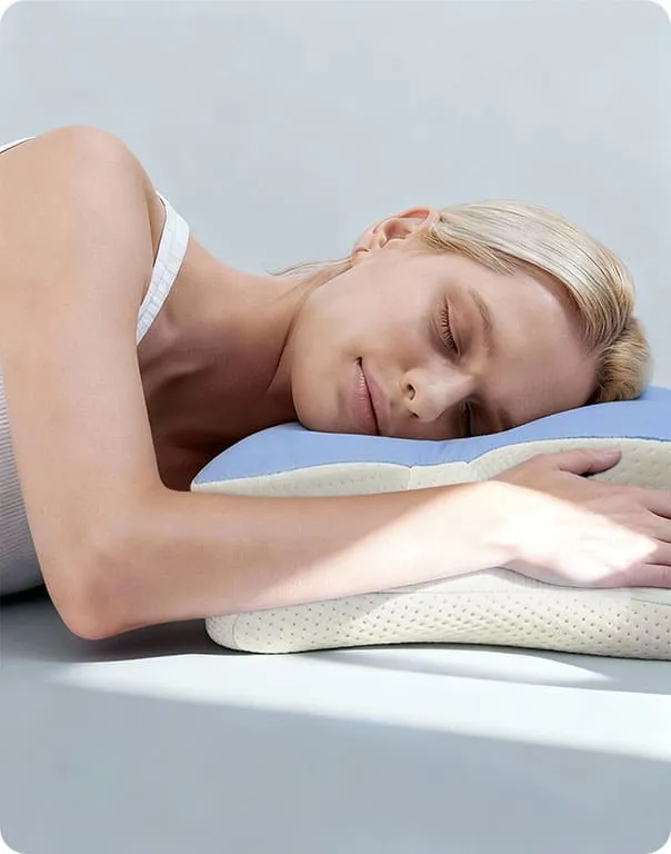 Sleeper lying on their side on the Melara Pillow
